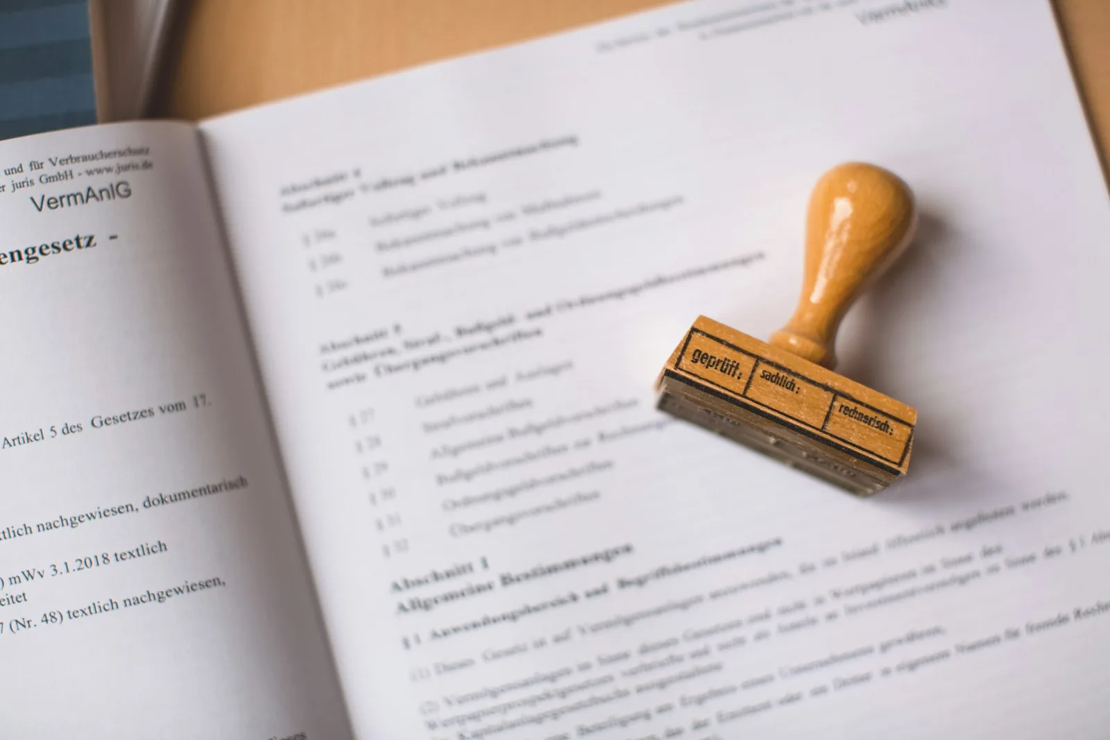 A verification stamp resting on an open legal document